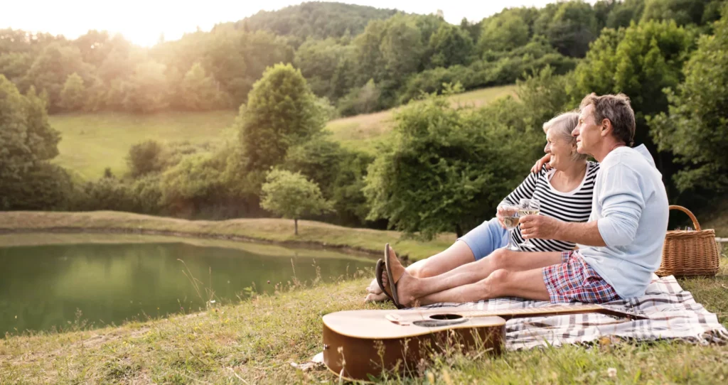Retirees enjoying a relaxing activity outside.
