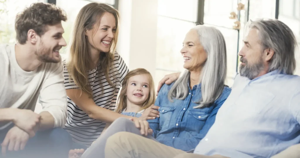 A family is playing a game that is a great family conversation starter