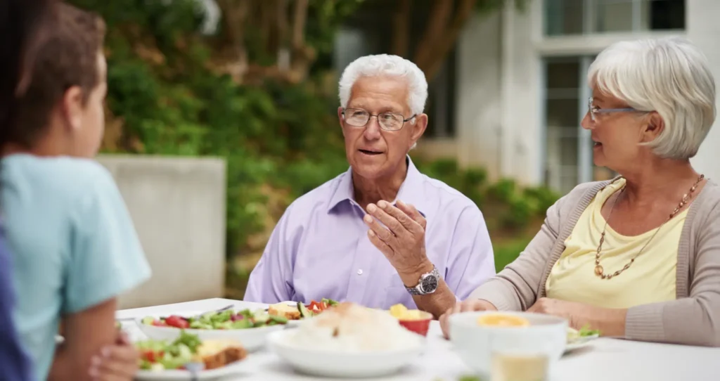 Grandparents playing the life lessons game with younger generations in their family