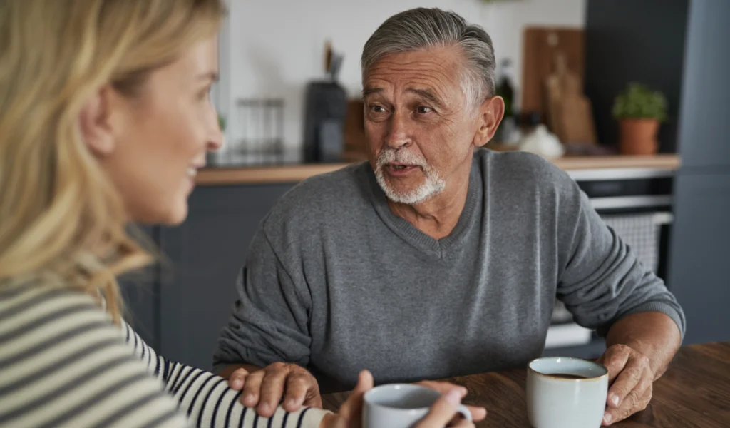 A daughter with her father - using questions to ask your dad to strengthen their relationship