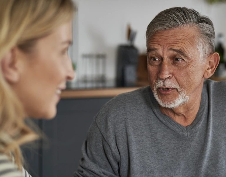A daughter talking with her dad