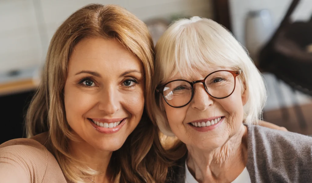 A lady with her mother, using questions to ask your mom, to understand her more deeply