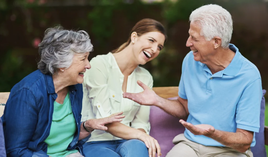 Two parents sharing stories about their life with their adult daughter 