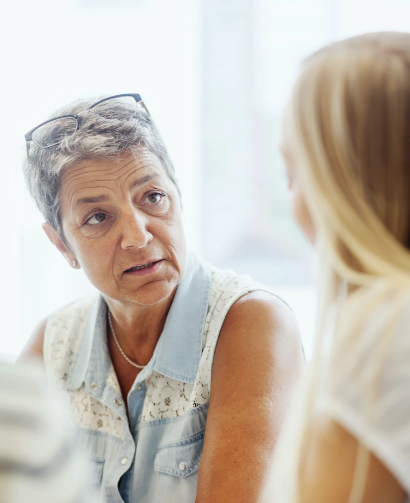A lady sharing advice with her daughter