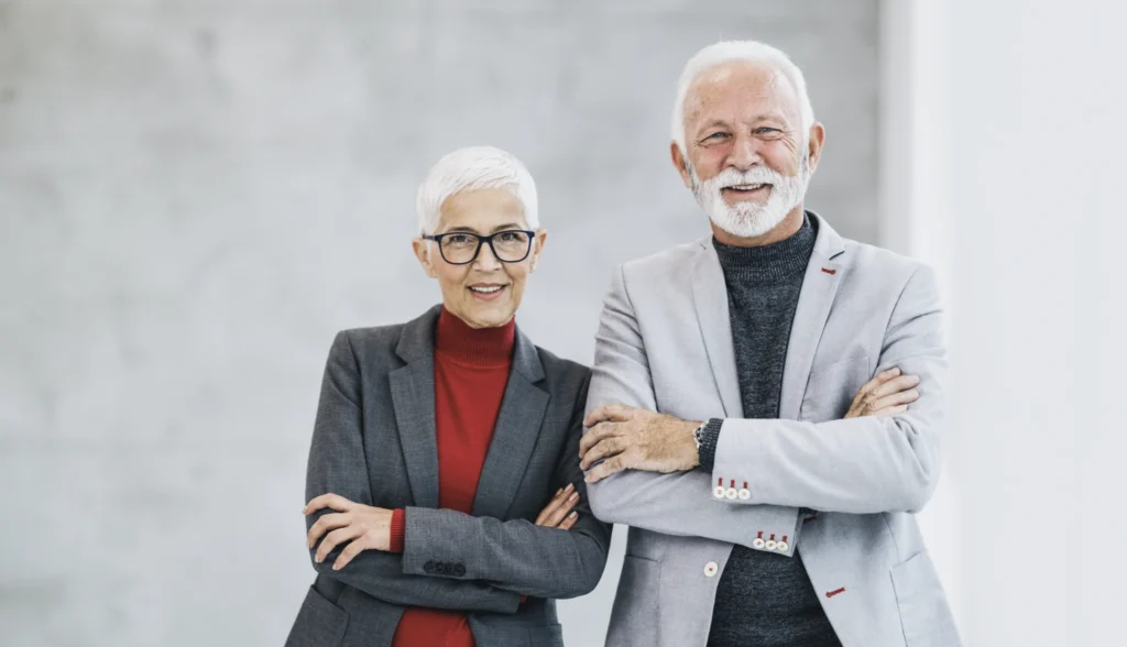 A senior man and woman looking professional. 