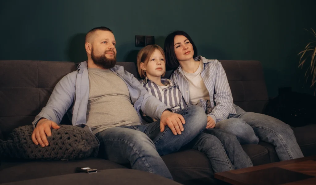 A family watching the Social Dilemma documentary on Netflix 
