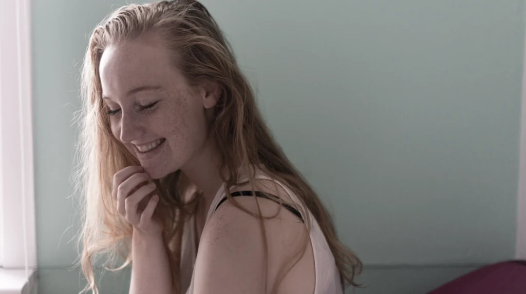 A teenage girl looking happy in her own skin 