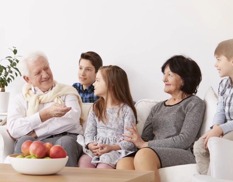 A grandfather sharing a story that comes from The Family Story Game
