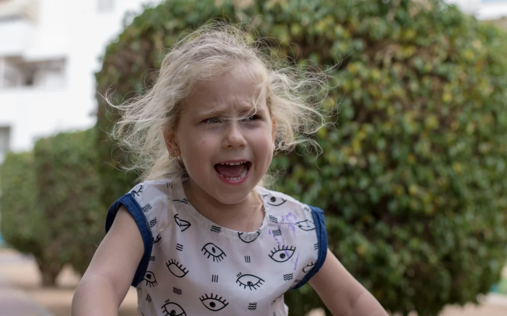 An upset child who is struggling to deal with her emotions 