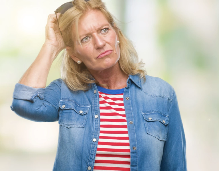 A lady trying to remember something