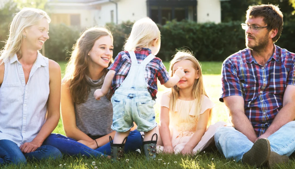 A happy family spending time together in the garden 