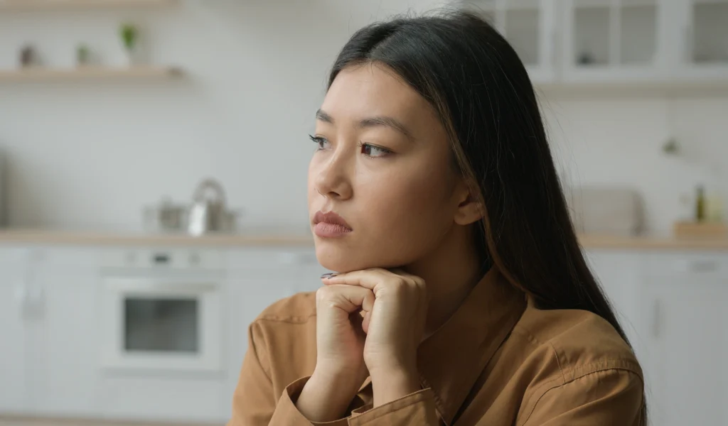 A lady carefully considers prioritising family values.