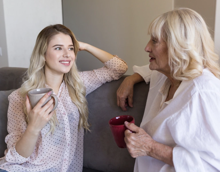 A mother and daughter sharing a story inspired by the family history game